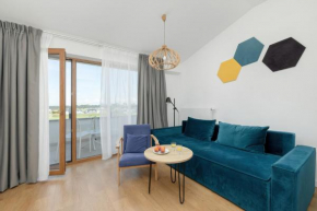 Klimatyzowany Apartament w Sarbinowie z Siłownią i Parkingiem by Noclegi Renters